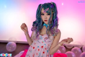 Ria Kurumi sucks lollipop and strips bra and panties showing shaved pussy