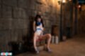 Ria kurumi seated on steps thighs parted